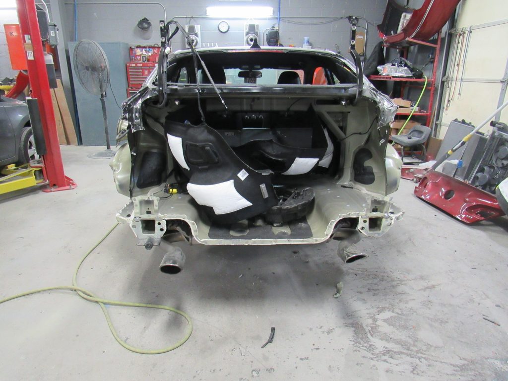 Car taken apart in a body shop in Louisville, KY